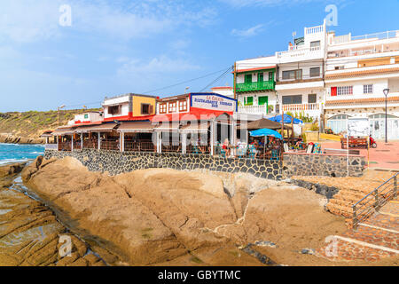 LA CALETA, TENERIFE ISLAND - NOV 14, 2015: restaurant in La Caleta fishing village on coast of Tenerife, Canary Islands, Spain. Stock Photo