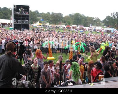 Members of the public attempt to set a new world record for the largest gathering of zombies during the Big Chill festival at the Eastnor Castle Deer Park in Herefordshire. Stock Photo