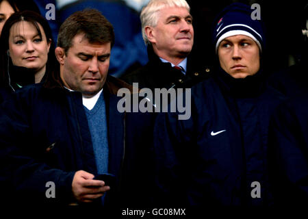 England's Jonny Wilkinson (r) glummly watches the game with friend and ex England teammate Jason Leonard (l) Stock Photo