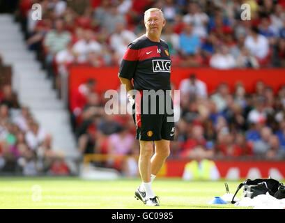 Manchester United manager Alex Ferguson during the training session at Old Trafford, Manchester. Stock Photo