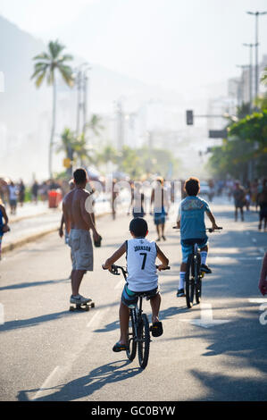 RIO DE JANEIRO - MARCH 6, 2016: Active residents take advantage of a car-free Sunday afternoon on the beachfront Avenida Vieira