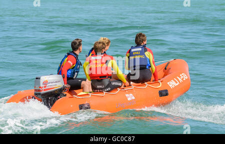 RNLI Arancia A-58 inflatable inshore rescue boat lifeguard training on the sea near Littlehampton Beach, West Sussex, England, UK Stock Photo