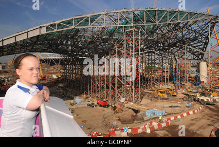 Paralympian double gold medallist Ellie Simmonds views the Olympic Park and Aquatic Centre at Stratford in London. Stock Photo