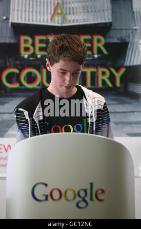 Teenagers, including Alexander Hill, 15, from King Alfred School in Golders Green, north-west London, presents his group's online service that they have designed over the course of the weekend as part of The Young Rewired State at Google's headquarters in central London. Stock Photo