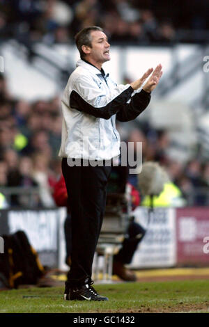 Derby County's manager George Burley urges his players on Stock Photo