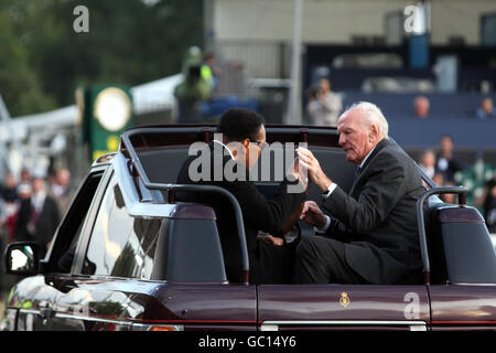 Ali Cooper reunion. Muhammad Ali and Sir Henry Cooper during day four of The European Show Jumping and Dressage Championships, Windsor. Stock Photo
