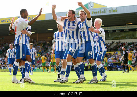 Colchester United's Clive Platt (9) is congratulated by team mates after scoring his second goal during the Coca Cola League One match at Carrow Road, Norwich. Stock Photo