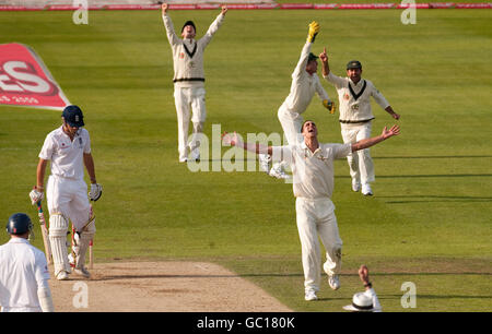 Australia's Mitchell Johnson celebrates dismissing England's Alastair Cook during the fourth test at Headingley, Leeds. Stock Photo