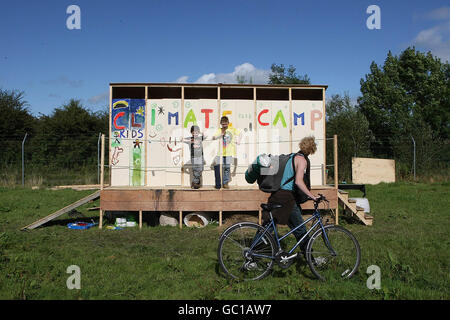 Ross Clair, 10 yrs, and Jack McCarthy, eight, join activists at Ireland's first climate camp which opened beside the Electricity Supply Board's Peat Burning Power Station in Shannonbridge Co.Offaly. Stock Photo