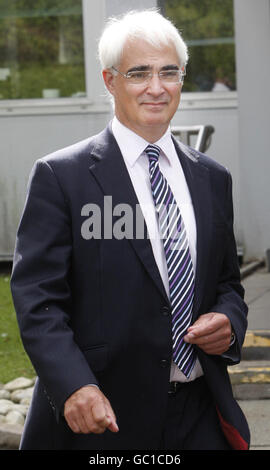 Chancellor Alistair Darling during a visit to HMRC 'Time to Pay' centre in Glasgow, a scheme to delay tax bills for those in financial difficulty. The Chancellor is looking after the country whilst the Prime Minister is on holiday. Stock Photo