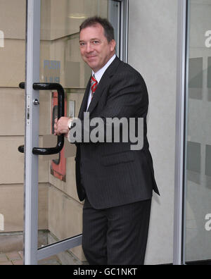 Matt Baggott, of Leicestershire police leaves the policing board headquarters in Belfast, prior to the announcement that he has been appointed the new Chief Constable of the Police Service of Northern Ireland tonight. Stock Photo