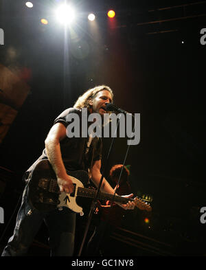 Pearl Jam, with lead singer Eddie Vedder, performing on stage at the O2 Shepherds Bush Empire in west London. Stock Photo