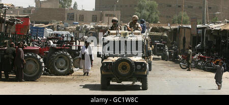 Members of The 40th Regiment The Royal Artillery in a snatch Land Rover during a patrol in Lashkar Gah, Afghanistan. Stock Photo