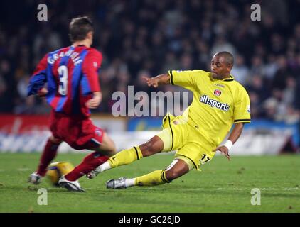 Crystal Palace's Danny Granville is tackled by Charlton Athletic's Shaun Bartlett Stock Photo