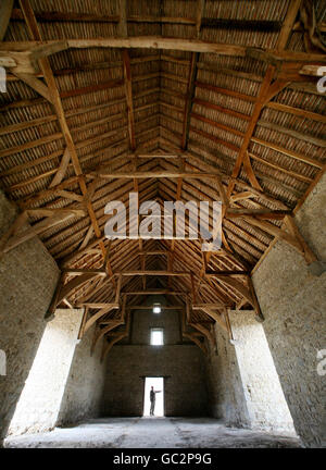 Graham Forge, director of G Forge Ltd, in an Elizabethan barn with a rare hammerbeam roof, built in the grounds of Westenhanger Castle near Hythe in Kent, after an extensive restoration project. Stock Photo