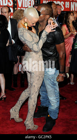 Musician Kanye West and Amber Rose arrive at the 2009 MTV Video Music Awards, held at the Radio City Music Hall in New York City, NY, USA. Stock Photo