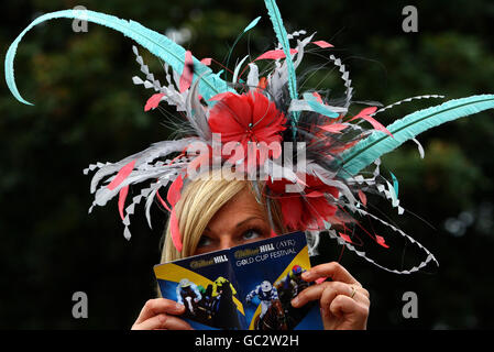 Alison Scott from Symington wearing a hat designed by Rachel Wilkes during the Gold Cup Festival at Ayr Racecourse, Ayr. Stock Photo