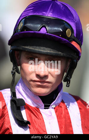 Horse Racing - The Ladbrokes St. Ledger Festival - The DFS Doncaster Cup Day - Doncaster Racecourse. Jockey Edward Creighton Stock Photo