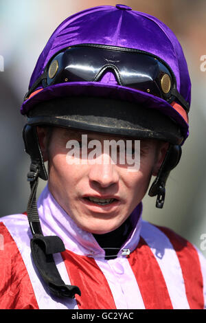 Horse Racing - The Ladbrokes St. Ledger Festival - The DFS Doncaster Cup Day - Doncaster Racecourse. Jockey Edward Creighton Stock Photo