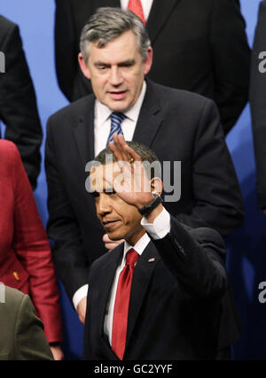 President Barack Obama waves at the top of the steps of Air Force One ...