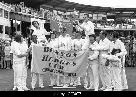 Kent captain Mike Denness, holding the cup, and Asif Iqbal, who won the Gold Award for the Outstanding Individual Performance, are carried shoulder high by their team mates after Kent's victory in the Benson and Hedges Cup final at Lord's. Stock Photo