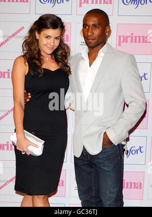 Jermain Defoe and Imogen Thomas arrive at the Comfort Prima High Street Fashion Awards at the Battersea Evolution in London. Stock Photo