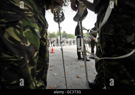 Soldiers rest their ceremonial swords during a rehearsal for a homecoming parade by the British army, to take place on September 17th in the garrison city of Paderborn, Germany. Stock Photo