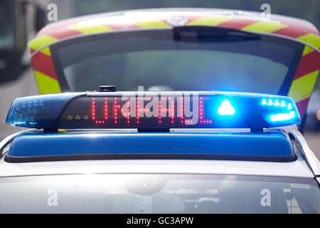 Illuminated sign Accident on a motorway police patrol car on the highway, Koblenz, Rhineland-Palatinate, Germany Stock Photo