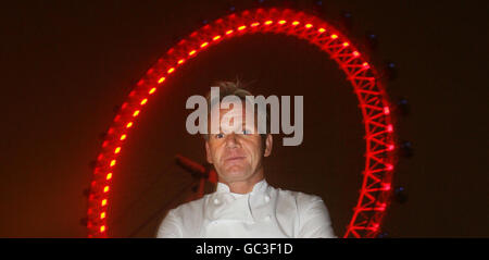 Chef Gordon Ramsay in front of the London Eye where he is cooking for guests travelling in one of the capsules, as part of the inaugural London Restaurant Festival. Stock Photo