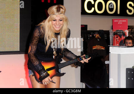 Pixie Lott launches the latest instalment of music making game, Guitar Hero at HMV Oxford Street in central London. Stock Photo