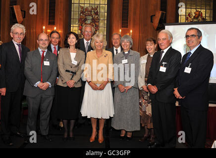 The Duchess of Cornwall (centre left) with members of St Andrew's Church in south Warnborough, Hampshire, (left to right) Sir Roy Strong, John Goodall, Johnny Kennedy, Valerie Humphrey, Graham Roberts, Peter Humphrey, Rev Jane Leese, Rev Kathy O'Loughlin, Peter Dawkins, and Arthur Gomez, after they won the Village Church for Village life Award, in central London. Stock Photo