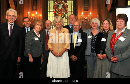 The Duchess of Cornwall (centre left) with members of St James the Great Church in Asklackby, Lincolnshire, (left to right) Sir Roy Strong, chris Gudgin, Denise Gudgin, John Goodall, Brian Wilkinson, Ian Grice, Hilary Wilkinson, Rev Anna Sorensen, and Julie Green, who were runners-up in the Village Church for Village life Award, in central London. Stock Photo