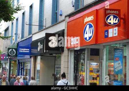 A general view of shop fronts dominated by mobile phone service providers in Nottingham city centre Stock Photo