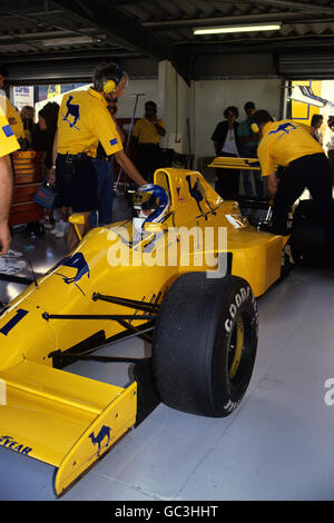 derek-warwick-sits-in-his-