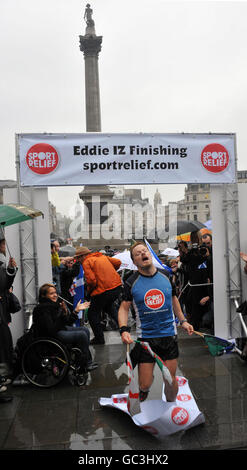 Comedian Eddie Izzard reaches the finish line after completing his 1,100mile run around the UK, in support of Sport Relief. Stock Photo