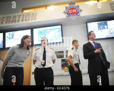 Conservative leader David Cameron and his wife Samantha meet police at Silver Command who are overseeing security at the Conservative Party conference in Manchester this week. Stock Photo