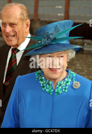 Queen Elizabeth II and the Duke of Edinburgh as they arrive at the Gloucestershire College, on the banks of the River Severn during a visit to the new building. Stock Photo