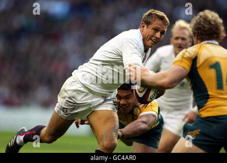 Rugby Union - Investec Challenge Series 2009 - England v Australia - Twickenham. England's England's Jonny Wilkinson is tackled by Australia's Will Genia Stock Photo