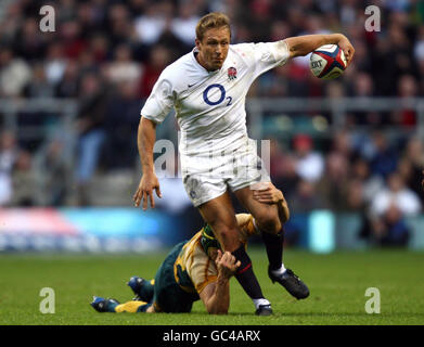 Rugby Union - Investec Challenge Series - England v Australia - Twickenham Stadium. England's Jonny Wilkinson is tackled by Australia's Matt Giteau during the Investec Challenge Series match at Twickenham Stadium, London. Stock Photo