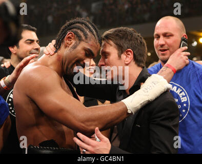 New WBA Heavyweight boxing Champion England's David Haye is congratulated by German promoter and Manager of Valuev, Kalle Sauerland (right), after beating Russian Nikolai Valuev on points in the WBA World Heavyweight Title bout at the Nuremberg Arena, Germany. Stock Photo
