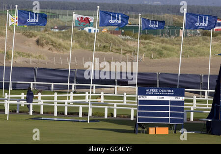 Flags blow in the gale force winds that forced the cancellation of the third round during the Alfred Dunhill Links Championship at St Andrews Golf Course, Scotland. Stock Photo