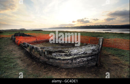 Harriett, the only remaining example of a Kennet barge, on the bank of the River Severn at Purton, Gloucestershire. Archaeologists have begun excavating boats from the river - Britain's largest 'ships' graveyard' - using 3D laser technology. Stock Photo