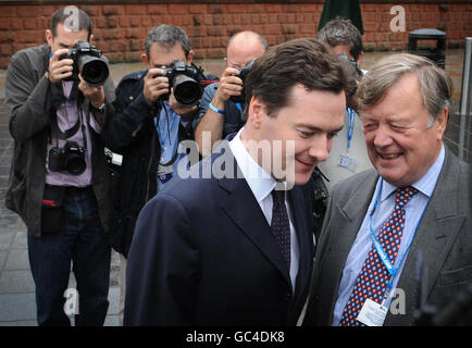 Shadow Chancellor George Osborne and Shadow Business Secretary Ken Clarke arrive at the Conservative Party conference in Manchester where Mr. Osborne is due to address delegates. Stock Photo