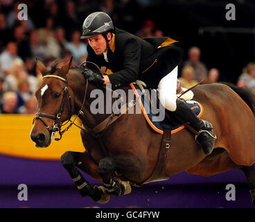 Great Britain's Guy Williams on Torinto van De Middelstde in the HOYS Leading Show Jumper of the Year, at the NEC, Birmingham. Stock Photo