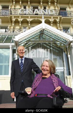 Lord Tebbit and his wife Margaret stand outside the Grand Hotel in Brighton, East Sussex on the 25th anniversary of the bombing of the building by the IRA on October 12, 1984. Stock Photo