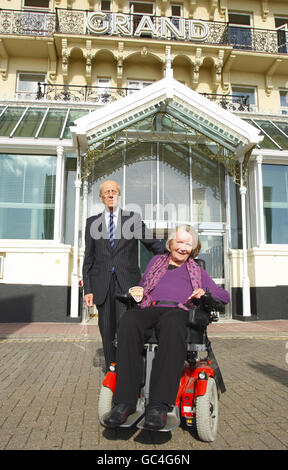 Lord Tebbit and his wife Margaret stand outside the Grand Hotel in Brighton, East Sussex on the 25th anniversary of the bombing of the building by the IRA on October 12, 1984. Stock Photo