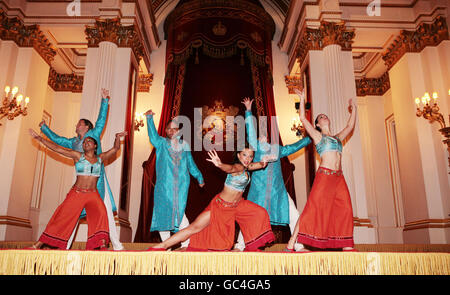 Dance group Nutkhut rehearse 'Bollywood Steps' inside the ballroom at Buckingham Palace ahead of the Indian Reception on Tuesday. Stock Photo