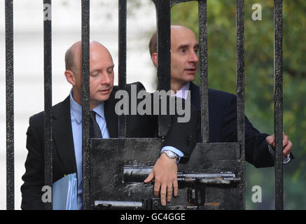 (left to right) Chief Secretary to the Treasury Liam Byrne and Transport Secretary Lord Adonis arrive in Downing Street this morning for the first cabinet meeting of the new parliamentary session. Stock Photo