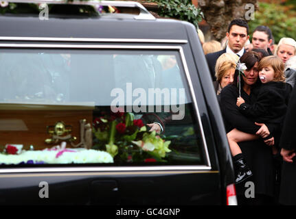 Colette Bysouth mother of Neve Lafferty watches her daughters coffin as it leaves St Joseph's Catholic Church in Helensburgh, Scotland where mourners gathered for the funeral of the 15-year-old girl who jumped from the Erskine Bridge to her death in an apparent suicide pact along with Georgia Rowe, 14, earlier this month. Stock Photo