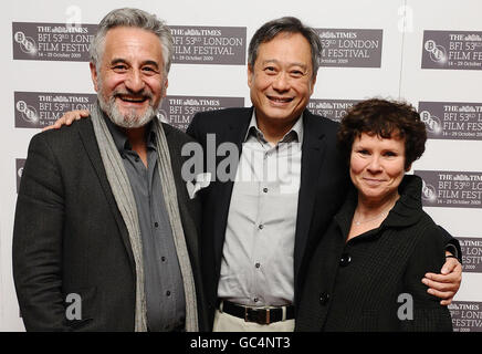 Henry Goodman (left), director Ang Lee and Imelda Staunton arrive at the premiere of Taking Woodstock, at the Vue West End cinema in London, part of the Times BFI 53rd London Film Festival. Stock Photo